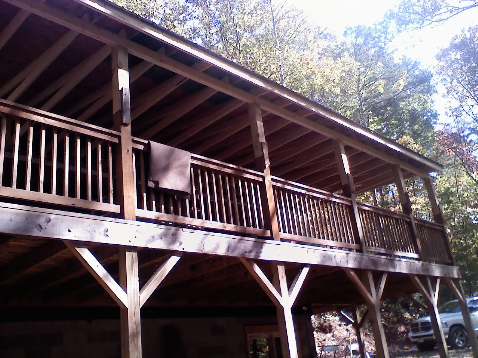 Timber framing under a new elevated porch and deck — Roof Leak Repair in Thief River Falls by Roofing Brothers